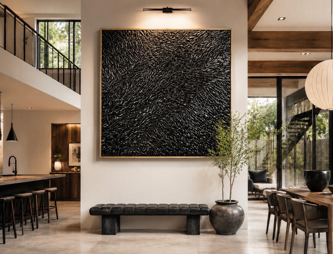 Motion captures movement in a moment that feels almost alive. Layers of rich black texture flow across the surface, drawing the eye in different directions as light moves across every raised detail.
