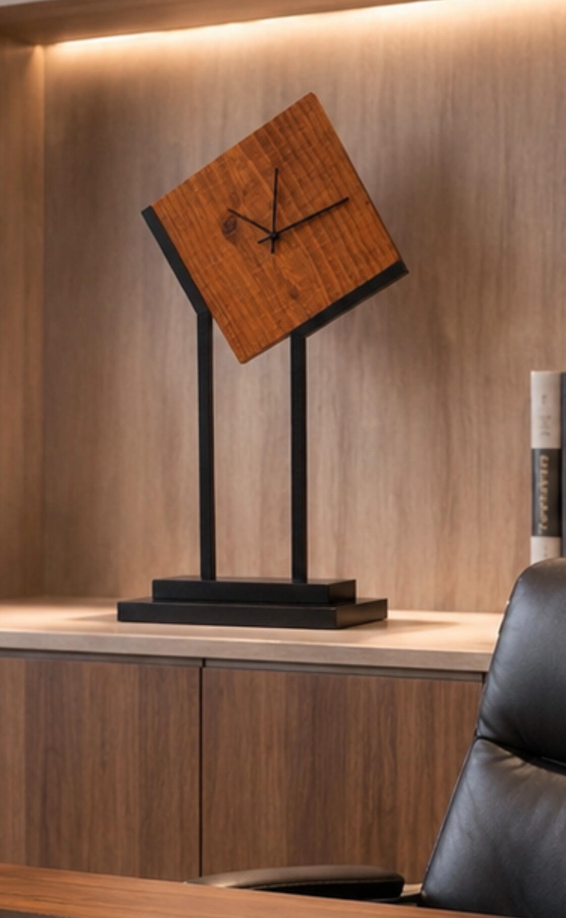 Off Center challenges the idea that everything meaningful has to follow a straight line. Handcrafted from rich natural wood and grounded by a bold black architectural base, the unexpected angle transforms a functional clock into a sculptural statement.